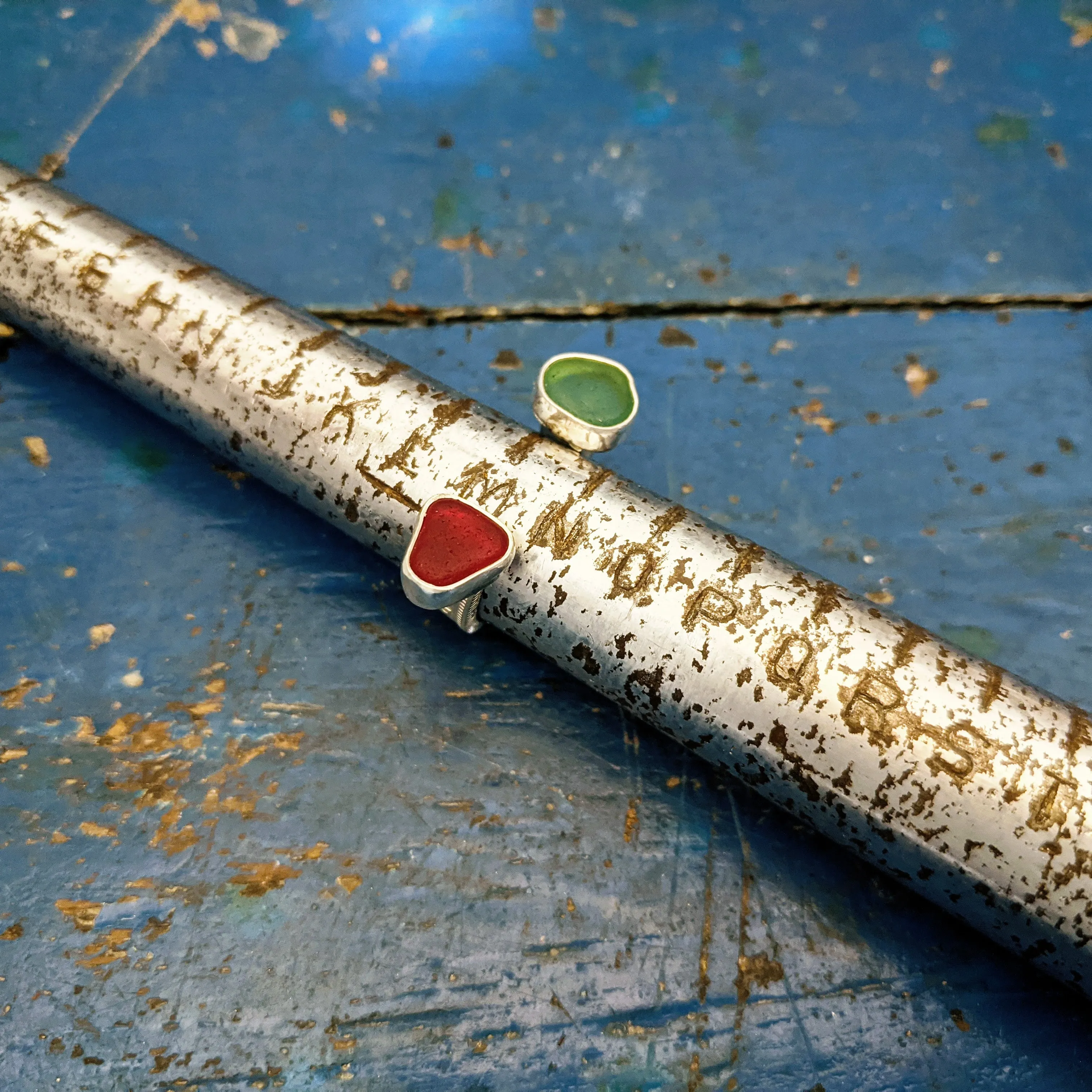 Floating Red & Green One Shilling Coin Ring