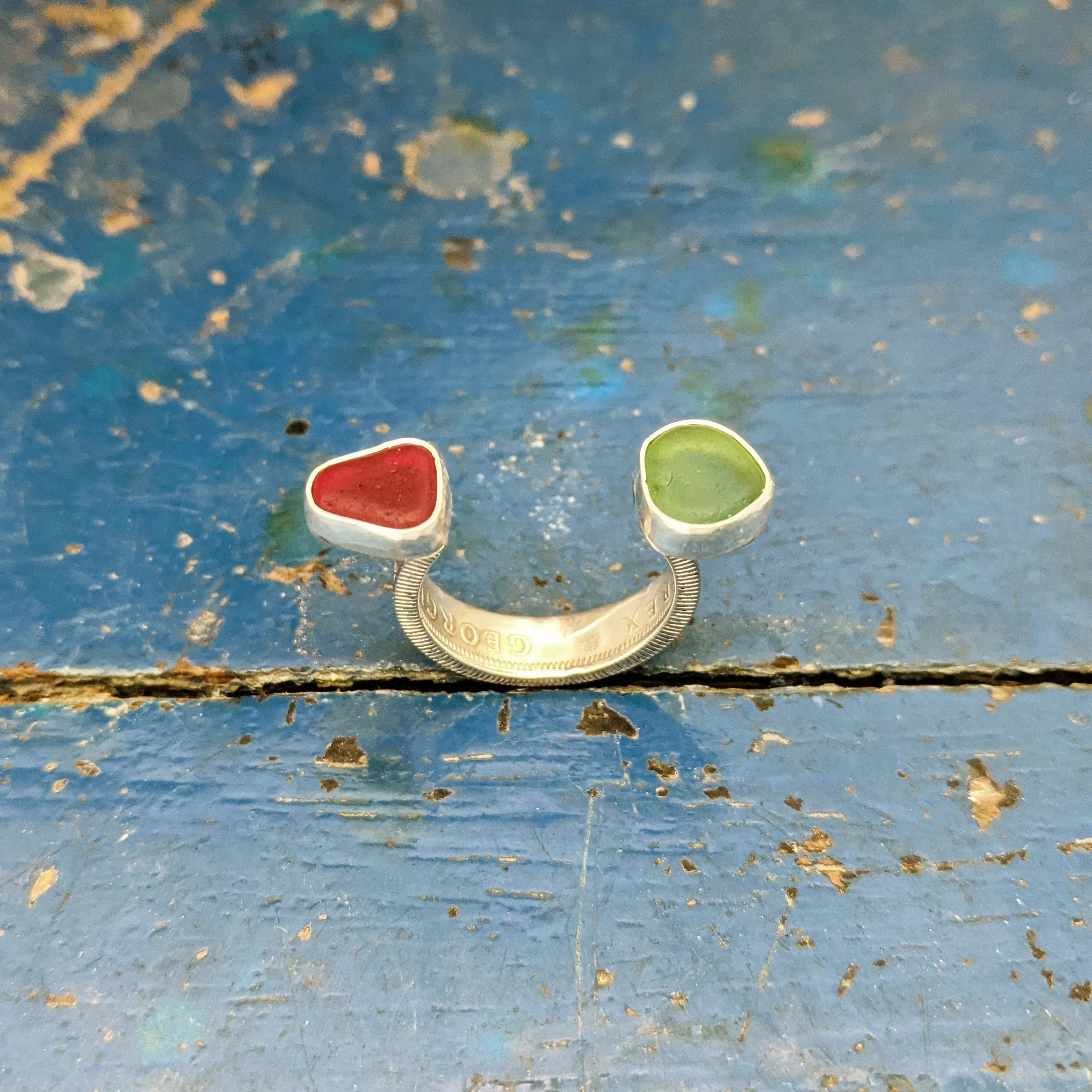 Floating Red & Green One Shilling Coin Ring