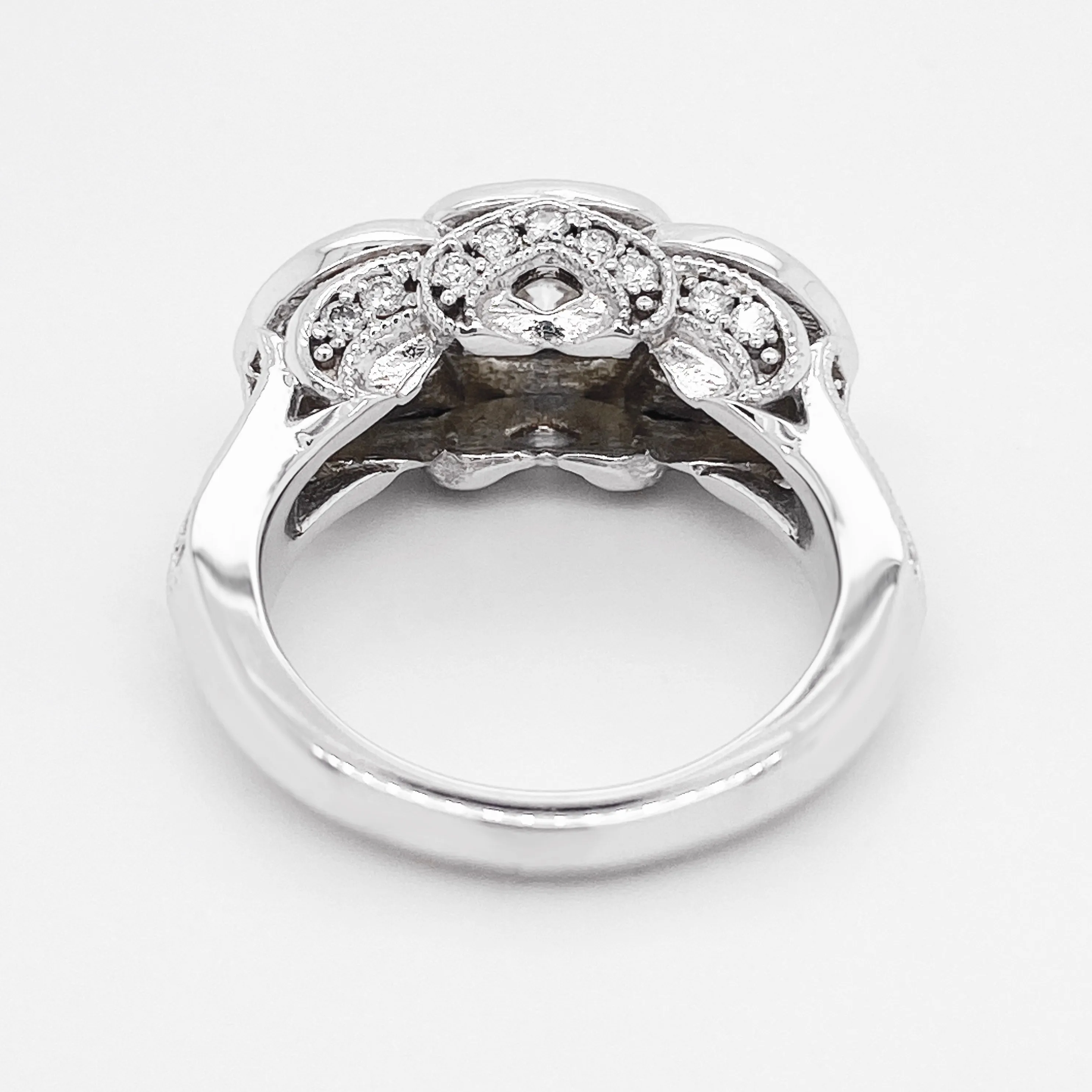 Halo Diamond Three-Stone Ring