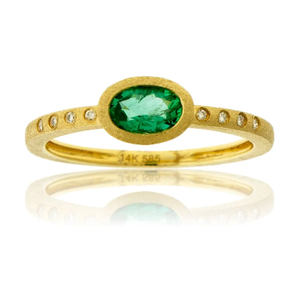 Oval Emerald and Diamond Flush Set Style Ring