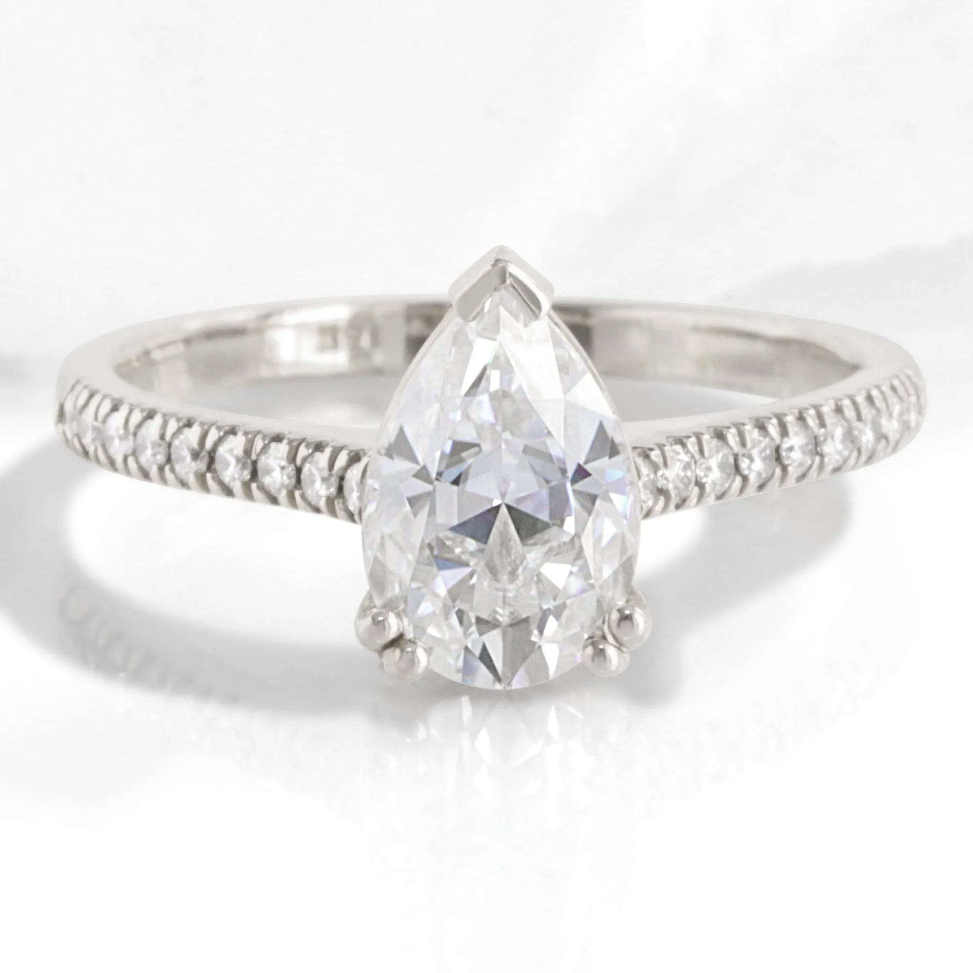 Pear Moissanite Engagement Ring in Grace Solitaire Pave Diamond Band