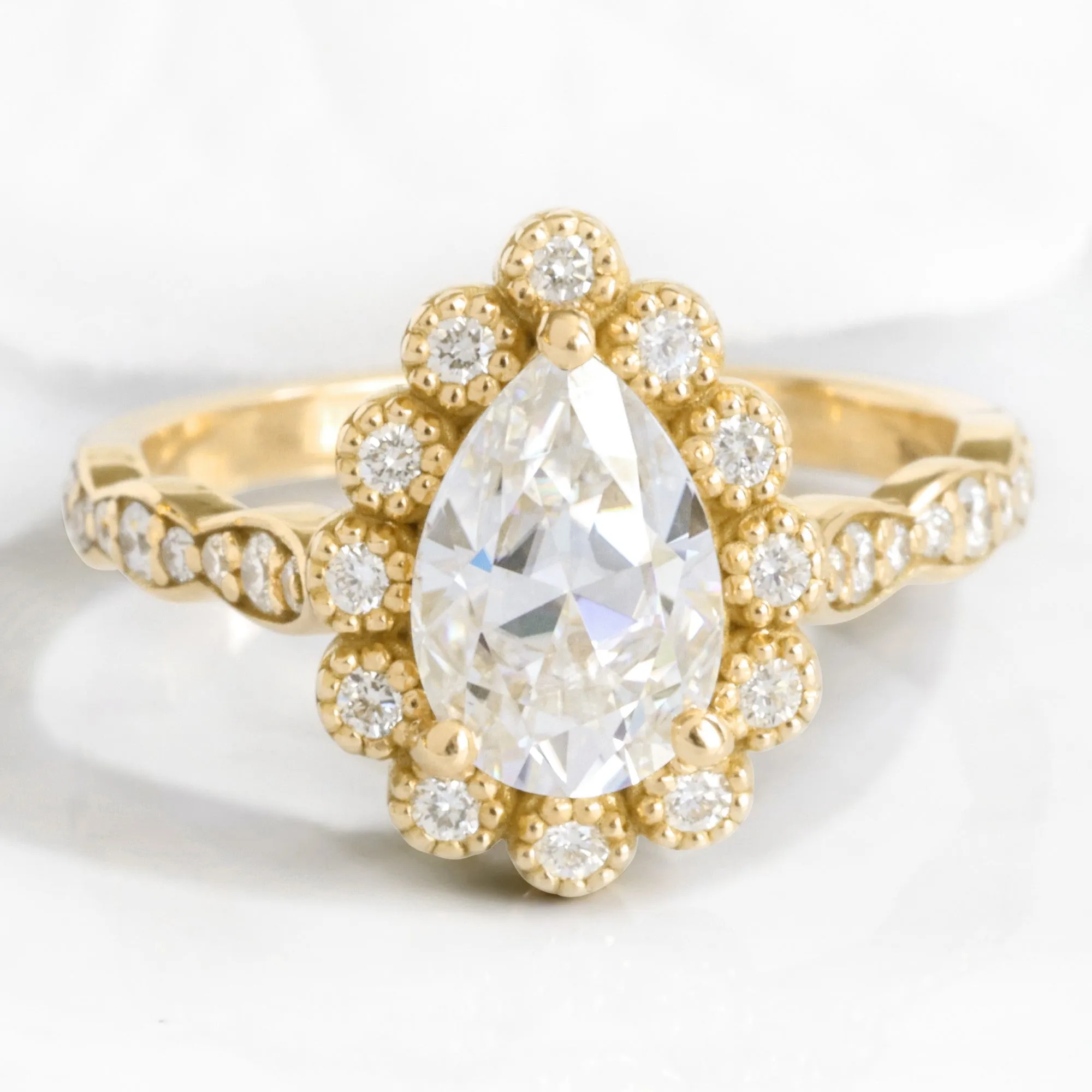 Pear Moissanite Engagement Ring in Vintage Luna Halo Diamond Ring