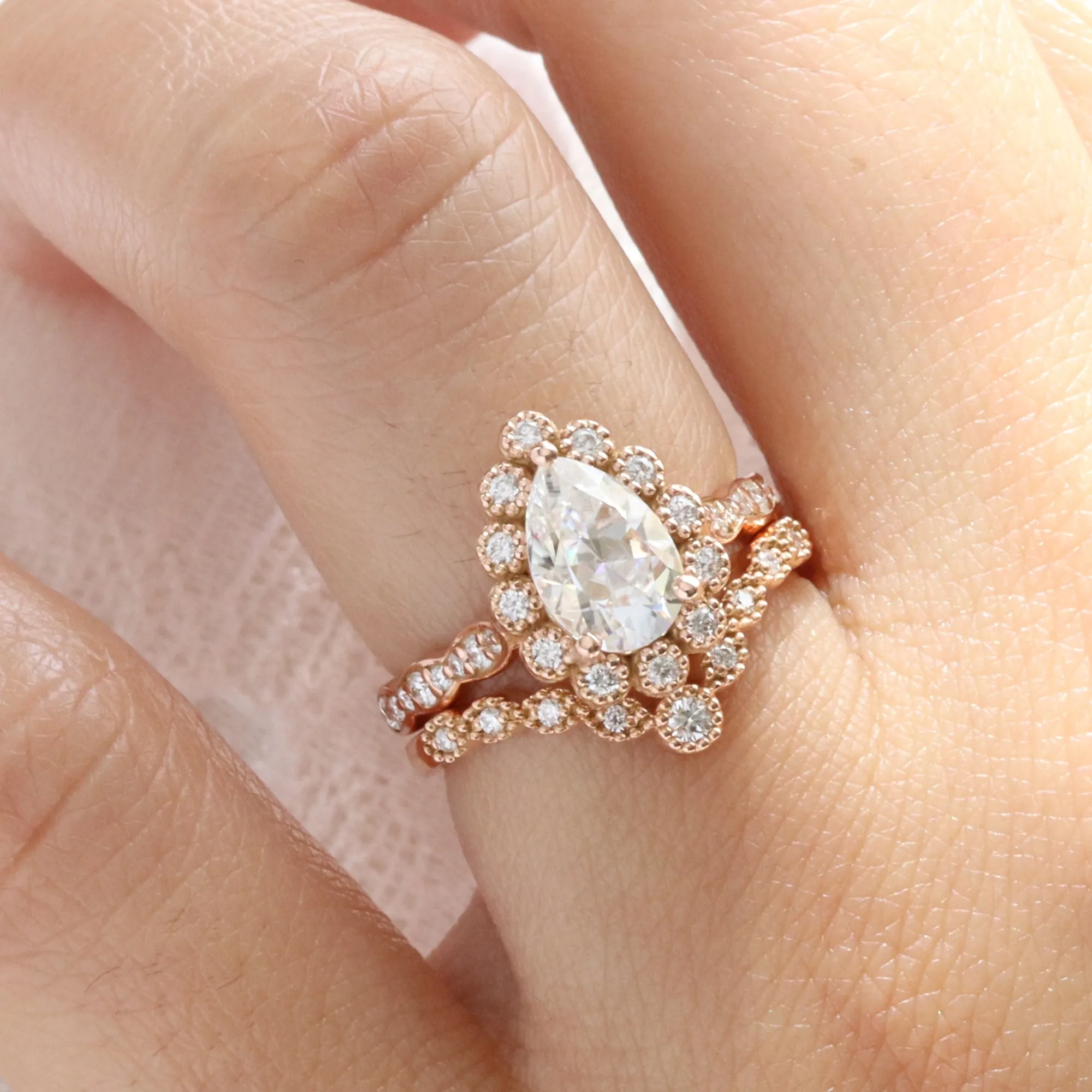 Pear Moissanite Engagement Ring in Vintage Luna Halo Diamond Ring