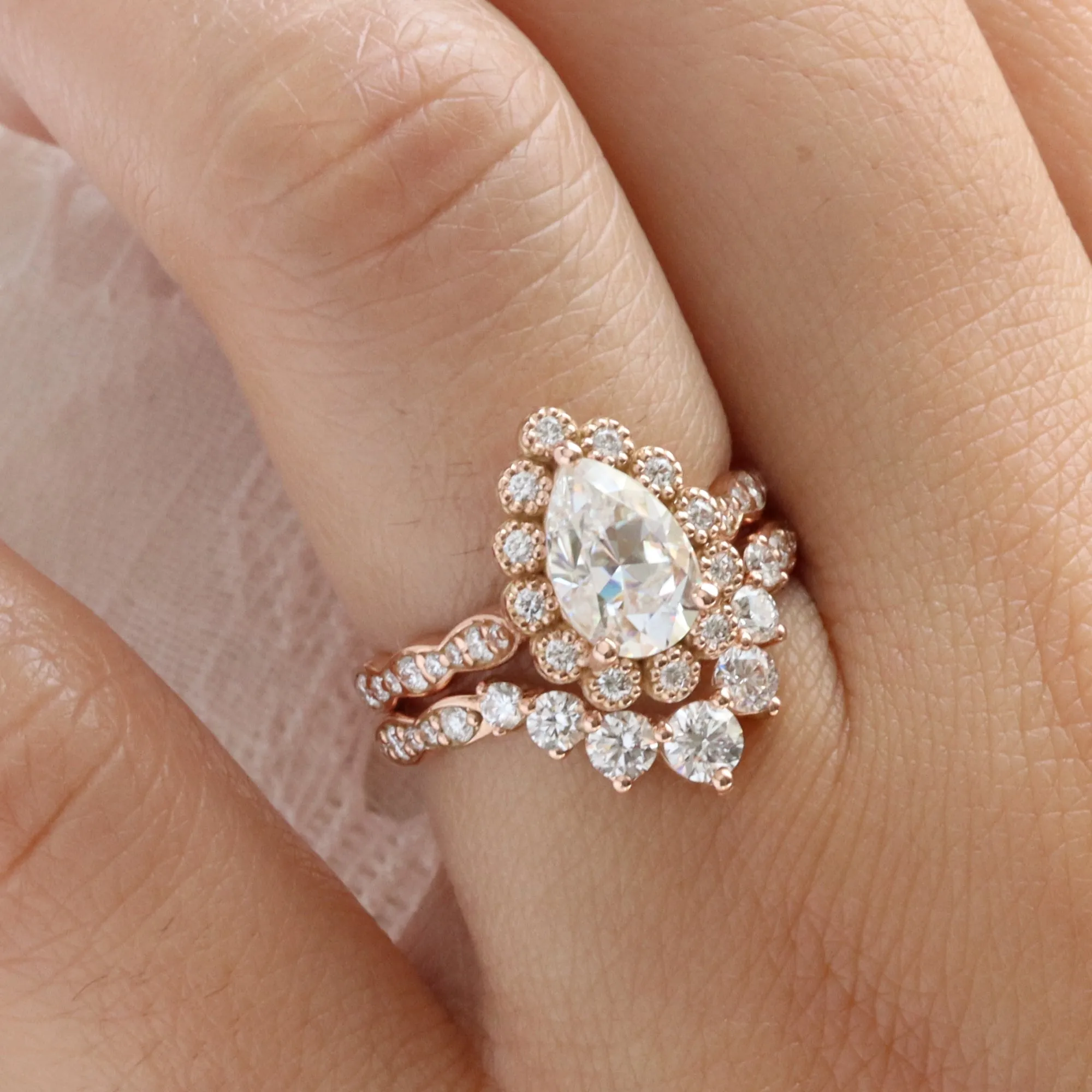 Pear Moissanite Engagement Ring in Vintage Luna Halo Diamond Ring