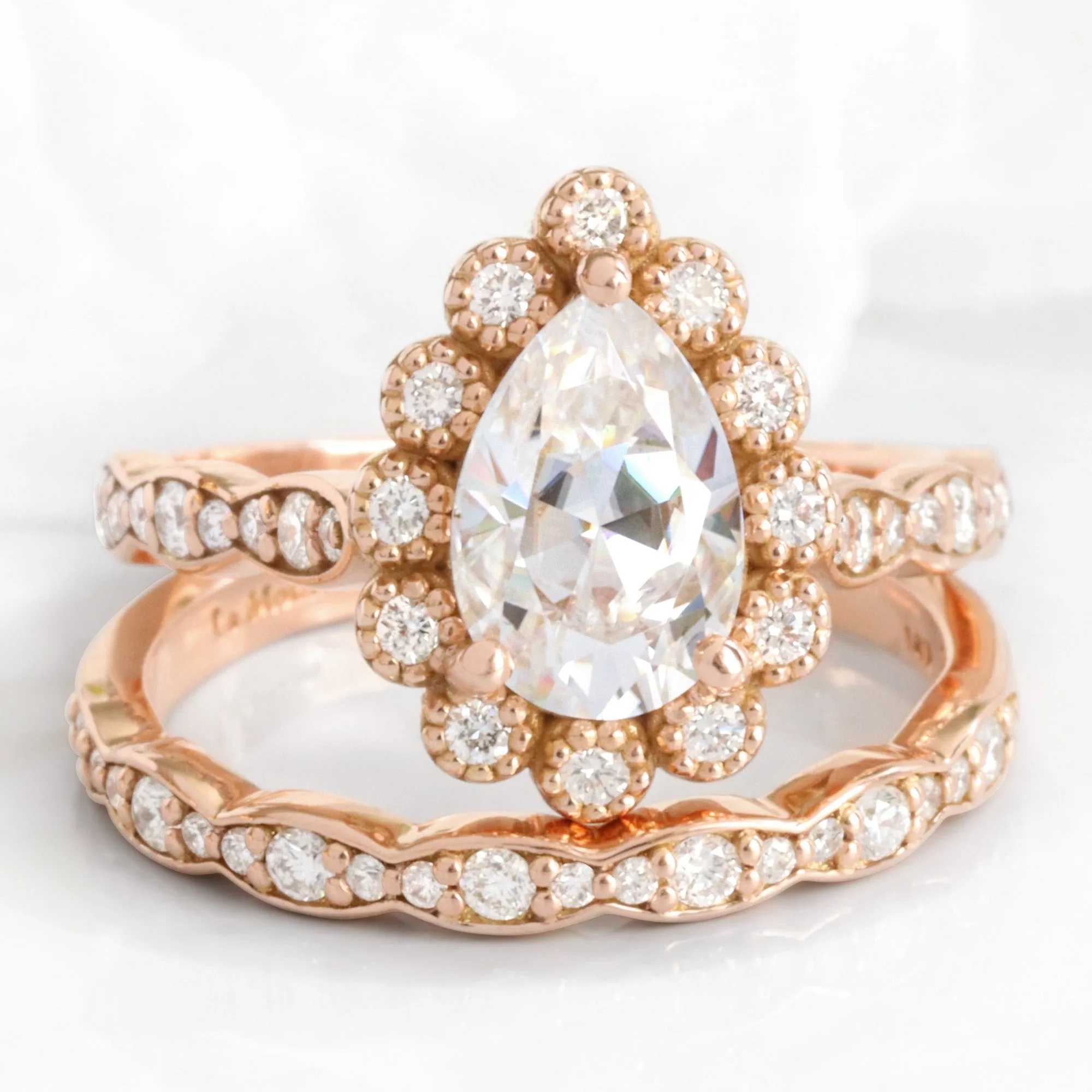 Pear Moissanite Engagement Ring in Vintage Luna Halo Diamond Ring