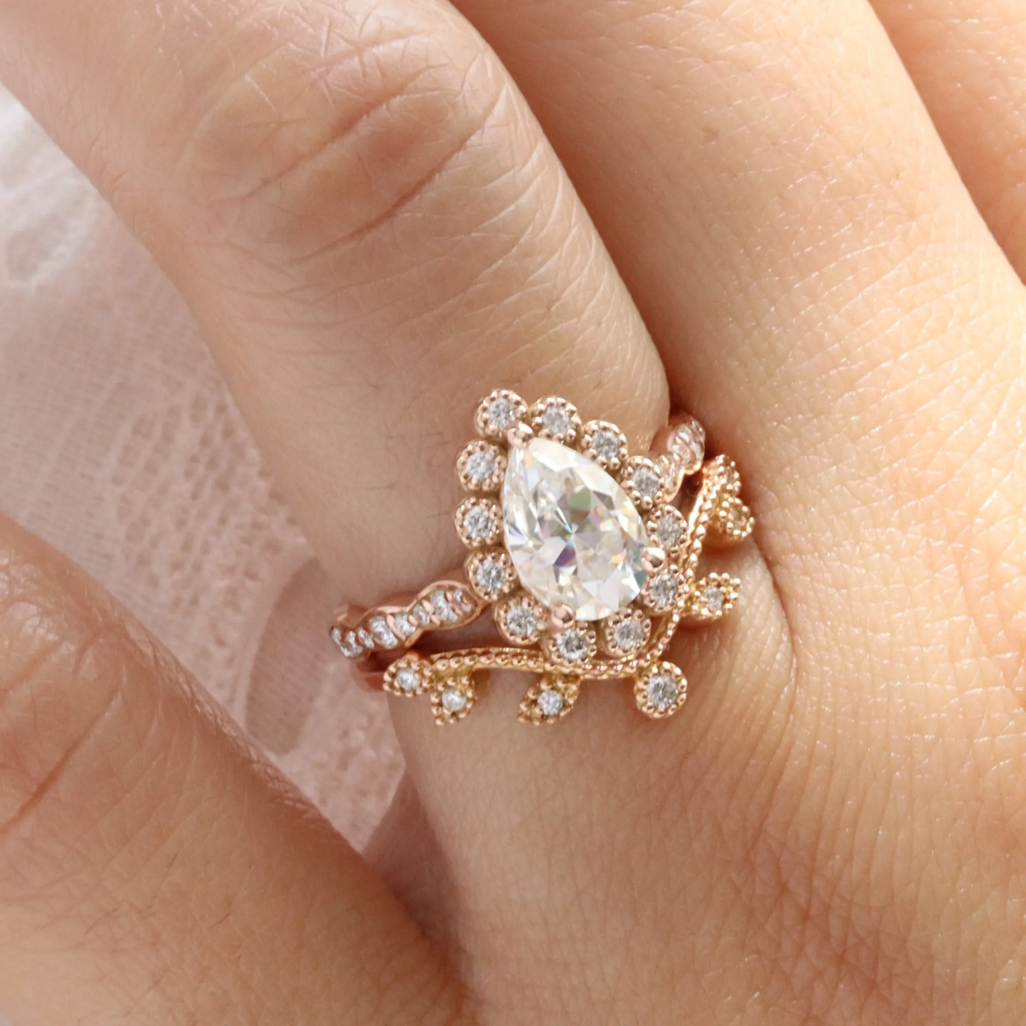 Pear Moissanite Engagement Ring in Vintage Luna Halo Diamond Ring