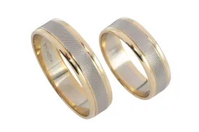 Set of 14 carat white and yellow gold wedding bands