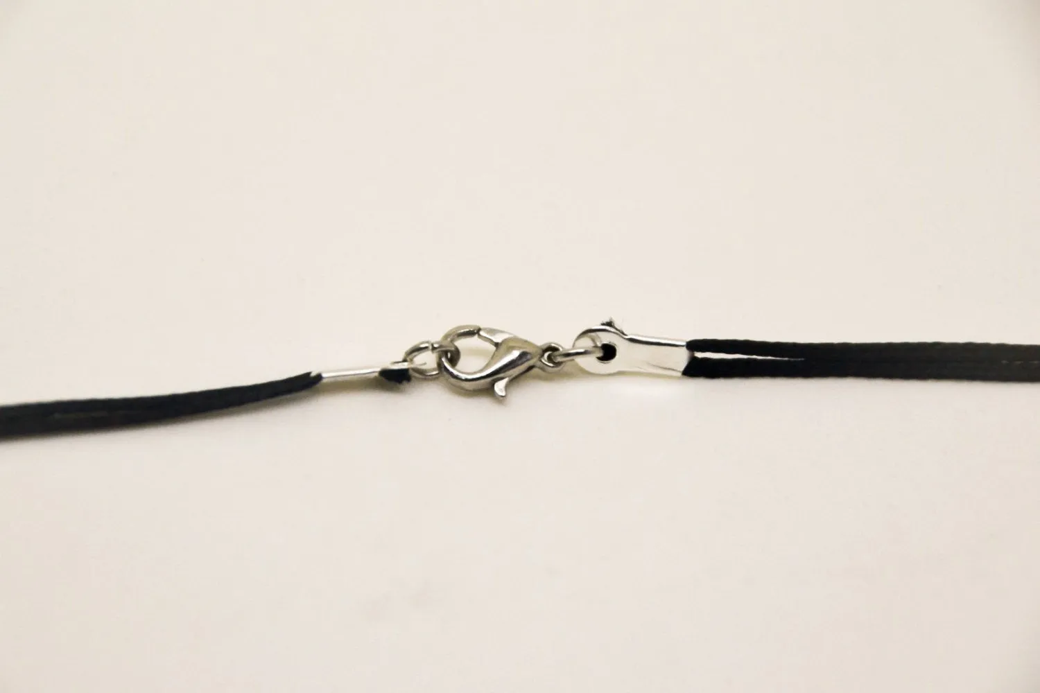 Silver plated whale tail necklace for men, black cord, gift for him