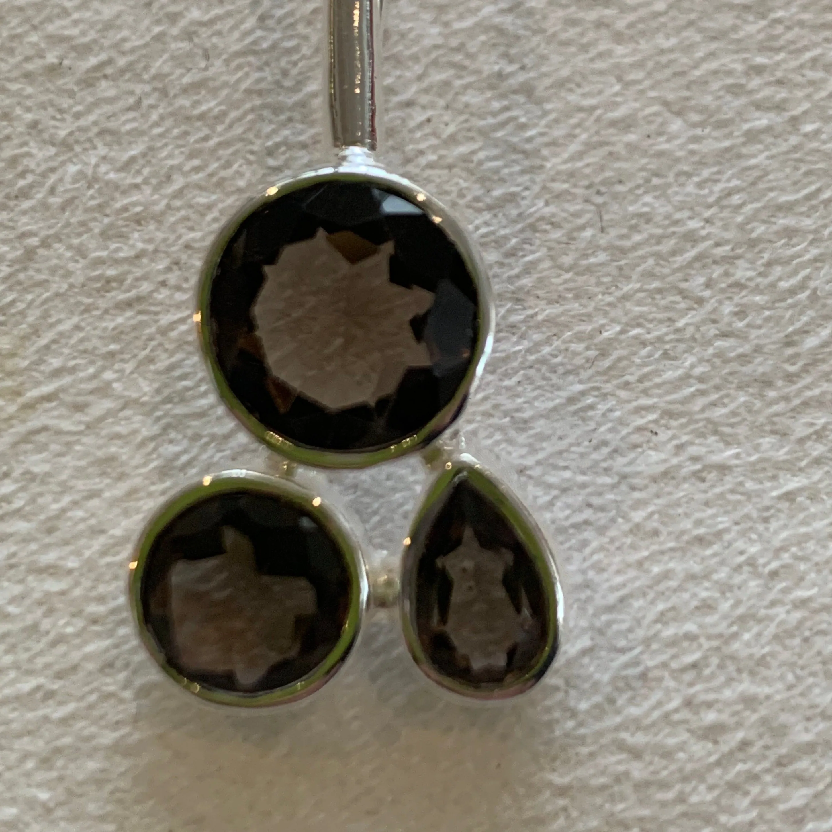 Smoky quartz stones and silver plated earring with three stones